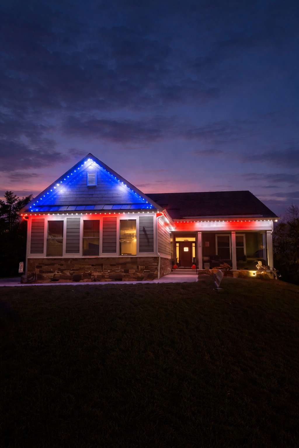 Patriotic red white and blue lights at dusk